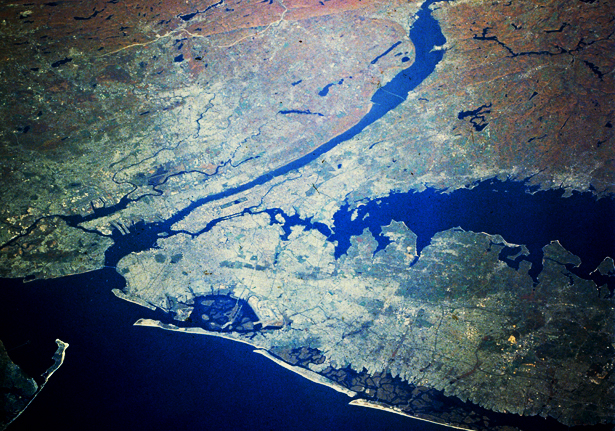 The Tri-State area is defined by the ocean's influence. From the top of the image, the tidal Hudson, bordered on the right by Westchester County and on the left by Rockland County and New Jersey to the south, drains from the north and enters the Atlantic Ocean. The tip of Sandy Hook NJ juts from the lower left corner. Long Island Sound, mid-right, borders eastern Westchester, Connecticut and the north shore of Long Island. View from Space Shuttle Columbia, mission STS-58. Public domain.